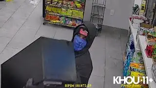 Caught on camera: Armed robber walks out of north Houston store carrying safe