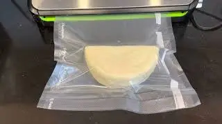 Double vacuum sealing a cheese