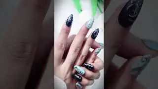These two-tone nails are the perfect choice With their shimmering silver patterns