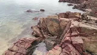Rocks coastwise in deep red