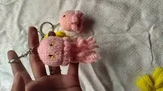 A crochet keychains octopus, bow , sunflower, and a jelly fish ❤🌷.... For tutorial do comments💬 