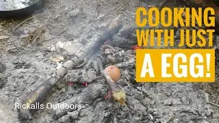 Cooking an egg on a fire | Minimal cooking equipment | Egg on coals