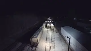 Grain Train loading while two trains meet(Drone video)
