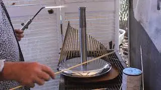 Richard Waters welding a waterphone, May 2012