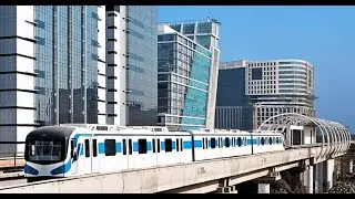 Rapid metro arriving at Sikanderpur metro station at night