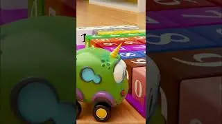 Cars play with toy blocks to see who can score the most points in a toy target game. #cartoons