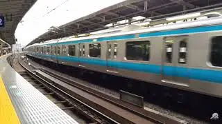 E233 1000 blows a loud horn while entering a station