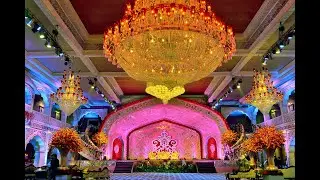 Pink Panorama | Royal Multicolour | Well lit Mandap | Chandelier | Pillars | Architecture | Decor