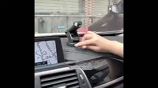 Car navigation holder retractable buckle gravity support center console car mobile phone holder