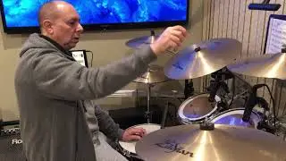 nick schepisi playing a salsa / songo drum beat