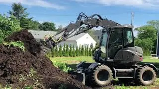 Mecalac 11MWR Turning and Moving Mountains of Organic Compost on a Hot Summer Day