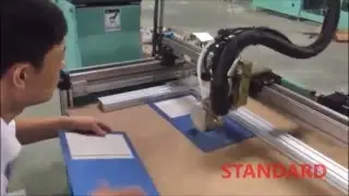 Automatic glue spraying machine