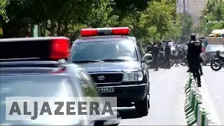 Iran attacks: Armed men storm parliament and Khomeini shrine