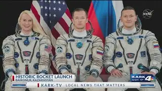 Russian-US crew welcomed aboard the space station