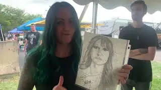 Sarah Anthony of The Letter Black signing my friend Rachel&rsquo;s drawing