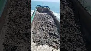 Split Hopper Barge dumping dredged materials
