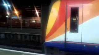 SWT 444009 departs Woking