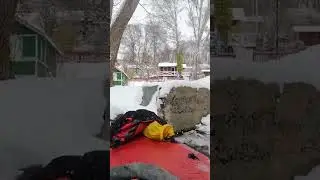 Getting ashore in snow after winter kayaking with Advanced Elements Packlite inflatable kayak