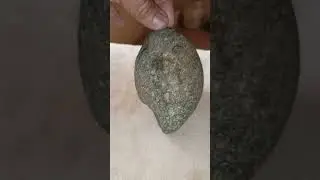 meteorite from mars? cracking like eggshell in surface, crack with olivine melted.. non magnetic