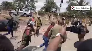 POLICE OFFICER IN  PLAIN CLOTHES DRAMATICALLY & WISELY ARRESTS A PROTESTER IN MATHARE!!