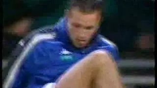 Lucas Neill stretching & spitting