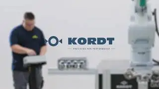 Full-automatic thread testing unit TRANSICORD 10500 on robot with exchange station for gauges