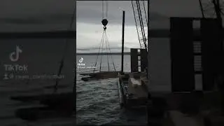 Lifting excavator on the shore of remote island #shorts