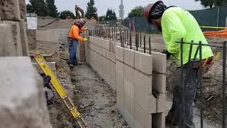 Laying block at work, stack bond, vertical rebar every 8 inches