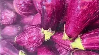 Fresh Purple Eggplants Showcased in an EyeCatching Vibrant Display of Color and Flavor
