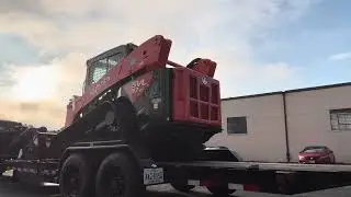 Loading a Cubota on Big Tex trailer 