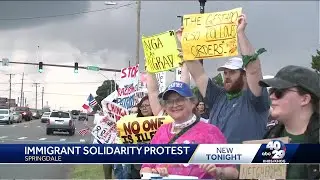 Large group show solidarity with immigrants in Springdale
