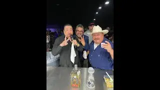 Jay Perez gets a drink at the bar during concert performance