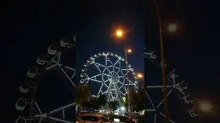 SM MOA EYE - ferris wheel with night lightning can take in city & bay views