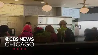 SNAP benefit recipients turn out for free meals at Manny's Deli