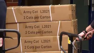 Crews deliver cots, fridges to new Boston shelter
