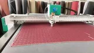 Vibrating knife cutting machine to help the automotive floor mat industry innovation and upgrading.
