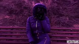 Symbolism of the coming of a new era. Walking girl in a spacesuit around the city. Girl in gas mask