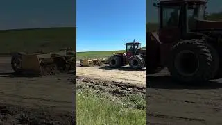 Who needs a motor grader when you have a tractor and box blade?