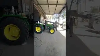 CRANE MOUNTED ON TRACTOR
