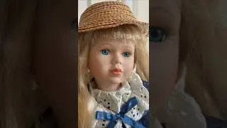 Porcelain doll with books, Avril From Leonardo Collection