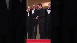 Joaquin Phoenix and Pedro Pascal wave hello to fans attending the 