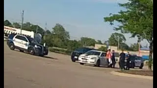 Police at the Target parking lot in Peoria.