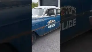 Do you know the year make model of this old Boston Police car