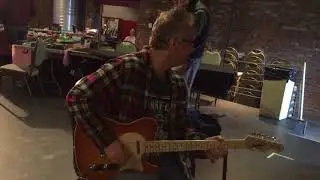 Mark Moree playing a Neville Guitar through an Edwards Amplification amp at The Nashville Guitar Sh