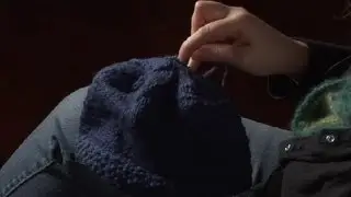 How to Finish a Knitted Hat by Threading Yarn Through the Remaining Stitches : Knitting Hats