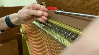 Replacing a bass string on a vertical piano