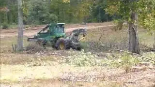 2009 John Deere 648H Skidder.wmv