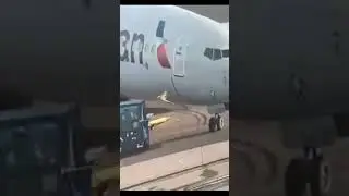 American Airlines Plane Over and Crushes Towing Vehicle at LaGuardia #avgeeks #shorts #pilotlife