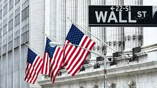 Stocks touch new records as Biden administration begins