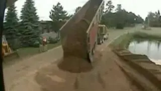 Dumb Driver Tips Over Dump Truck&rlm;